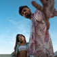 A young Couples posing in floral shirt