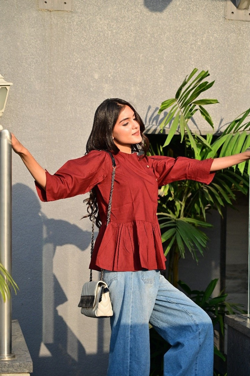 Sakshi's Maroon Peplum Buttoned Top