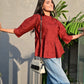 Sakshi's Maroon Peplum Buttoned Top