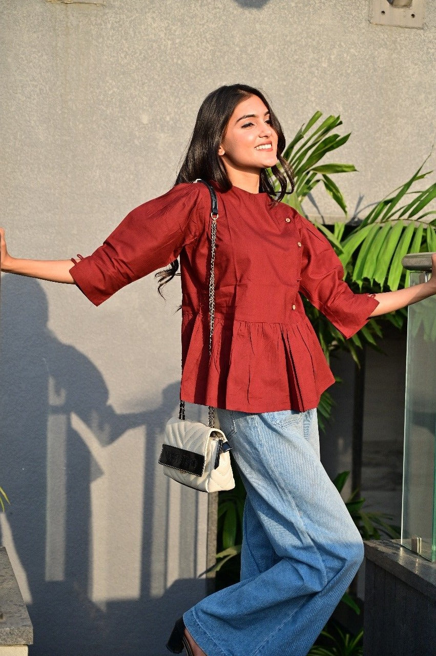 Sakshi's Maroon Peplum Buttoned Top