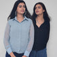 Two girl posing in a casual shirt