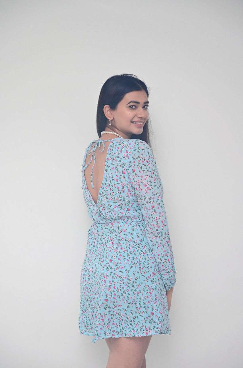 A pretty girl in blue floral dress