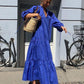 A women posing in blue Cotton Dress