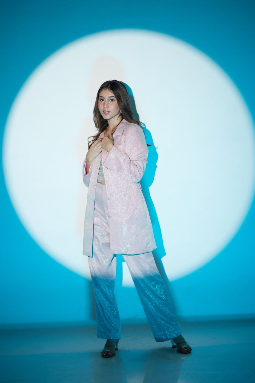 A beautiful model posing in pink blazer set 