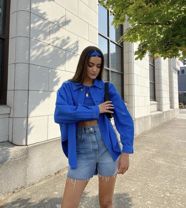 A Girl in a Blue Oversized Casual Shirt