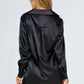 A young lady in black satin Bottom dress